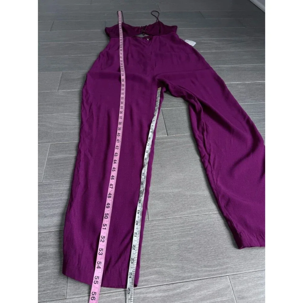 Free People Nolita Romper Small Plum Cutout Boho Festival Jumpsuit NWT Magenta S